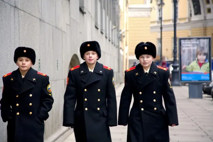 Framed Print : Russia, St. Petersburg; Three young cadets walking in the main streets of the city Framed Print : Russia, St. Petersburg; Three young cadets walking in the main streets of the city