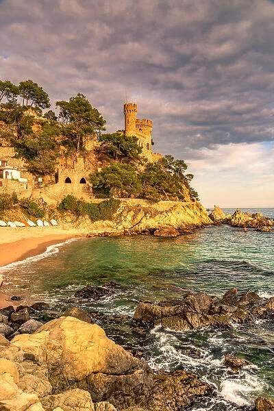 Sa Caleta beach with Castillo d en Plaja castle in the background, Lloret de Mar
