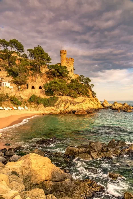 Framed Print : Sa Caleta beach with Castillo d en Plaja castle in the background, Lloret de Mar Framed Print : Sa Caleta beach with Castillo d en Plaja castle in the background, Lloret de Mar