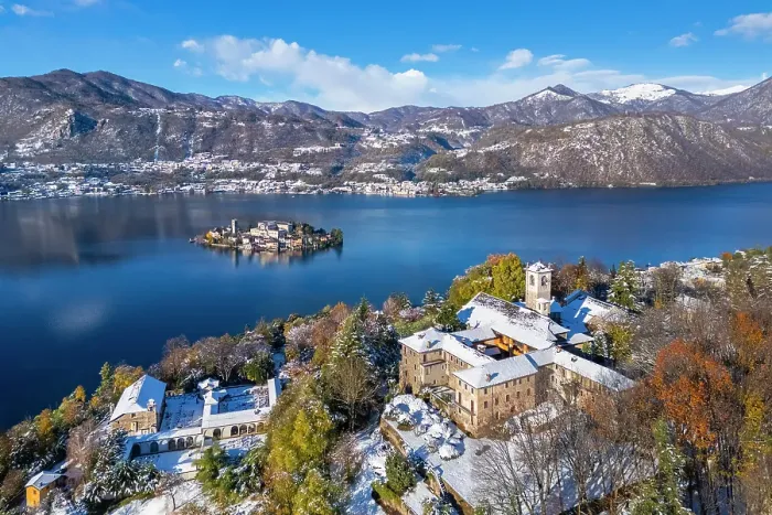 Framed Print : Sacro Monte of Orta and San Giulio island on Lake Orta in winter after a snowfall. Orta Lake, Province of Novara, Piedmont, Italy Framed Print : Sacro Monte of Orta and San Giulio island on Lake Orta in winter after a snowfall. Orta Lake, Province of Novara, Piedmont, Italy