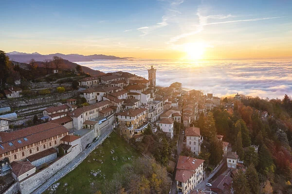 Sacro Monte of Varese an in background the sea of fog during sunrise, Varese, Lombardy, Italy