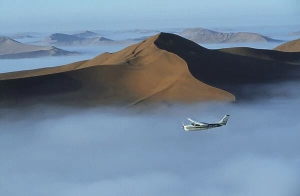 Safari flights over red sand dunes of Sossusvlei with