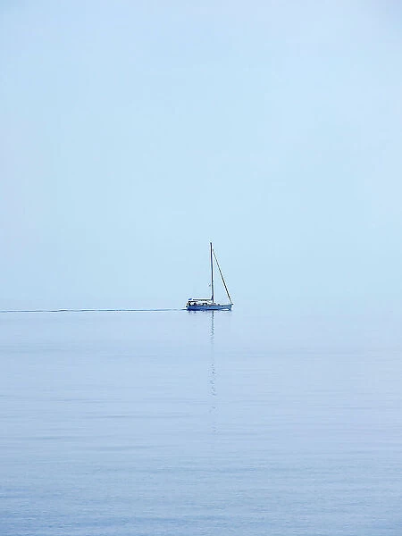 Sailboat at the Aegean Sea near Tilos Island, Dodecanese, Greece