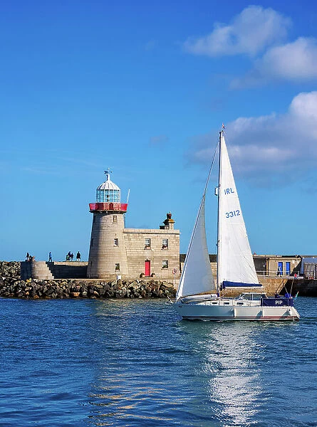 Sailboat in front of the Howth Lighthouse, Howth, County Dublin, Ireland
