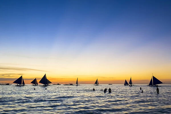 Sailboats at sunset on White Beach, Boracay Island, Aklan Province, Western Visayas