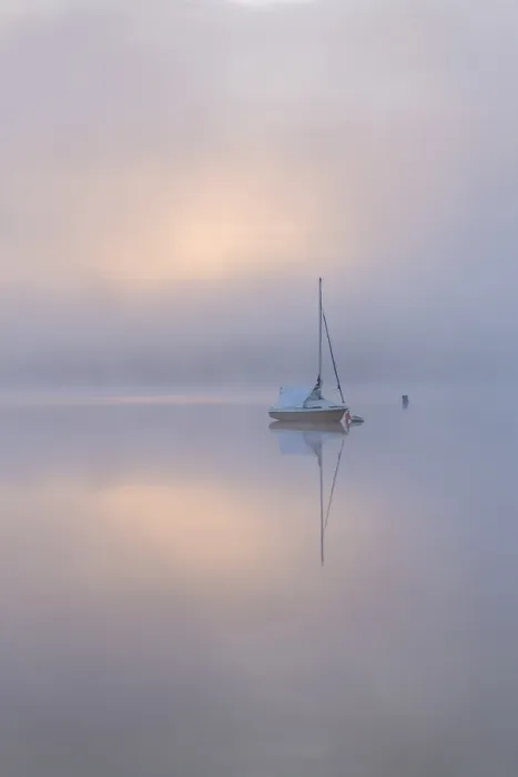 Framed Print : Sailing boat in misty conditions at dawn on a reflective Wimbleball Lake, Exmoor National Park Framed Print : Sailing boat in misty conditions at dawn on a reflective Wimbleball Lake, Exmoor National Park