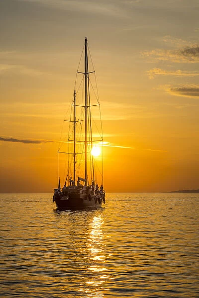 Sailing boat at sunset, Mykonos Town, Mykonos, Cyclade Islands, Greece