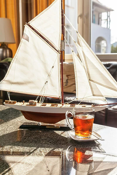 Sailing ship model and tea set in the salon of a hotel in Kuehlungsborn, Mecklenburg-West Pomerania, Baltic Sea, Northern Germany, Germany