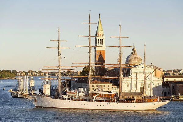Sailing ship in St Mark basin, on the background San Giorgio Maggiore island. Venice