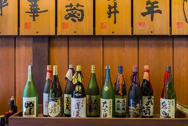 Sake bottles in a sake brewery, Takayama, Gifu Prefecture, Japan