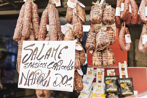 Salami and cured hams for sale at stall, Naples, Italy, Europe