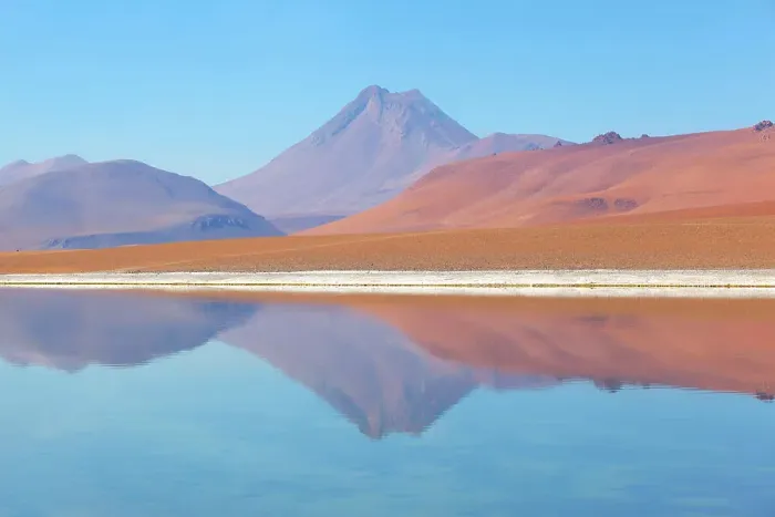 Framed Print : The Salar de Pujsa salt flat and Acamarachi volcano (also known as Pili volcano), Antofagasta Region, Chile Framed Print : The Salar de Pujsa salt flat and Acamarachi volcano (also known as Pili volcano), Antofagasta Region, Chile