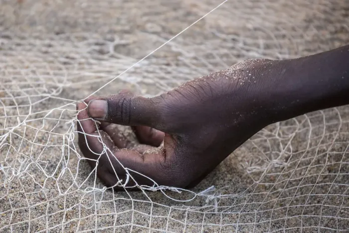 Framed Print : Salima, Malawi Lake, Africa. Hand of a net weaver