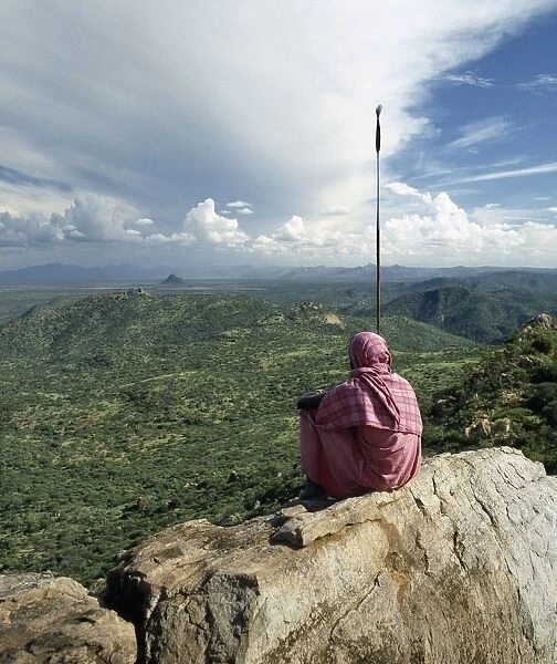 A Samburu man looks out over a vast tract of unspoilt