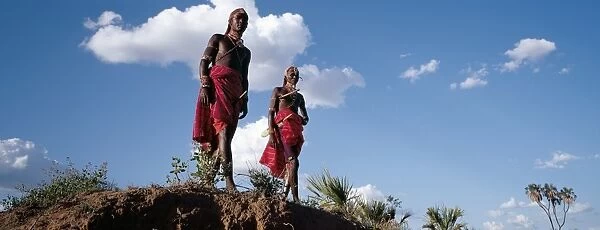 Two Samburu warriors resplendent with long Ochred braids