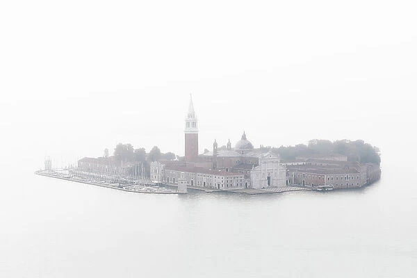 San Giorgio Maggiore island emerging from dense fog, Venice, Veneto, Italy