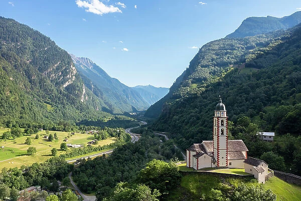 San martino church of Soazza dominating the road to San Bernardino pass. Graubunden, Moesa district, Switzerland