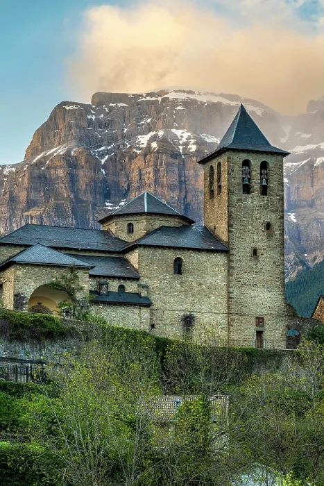 Framed Print : San Salvador church with Mondarruego mountain behind, Torla, Aragon, Spain Framed Print : San Salvador church with Mondarruego mountain behind, Torla, Aragon, Spain