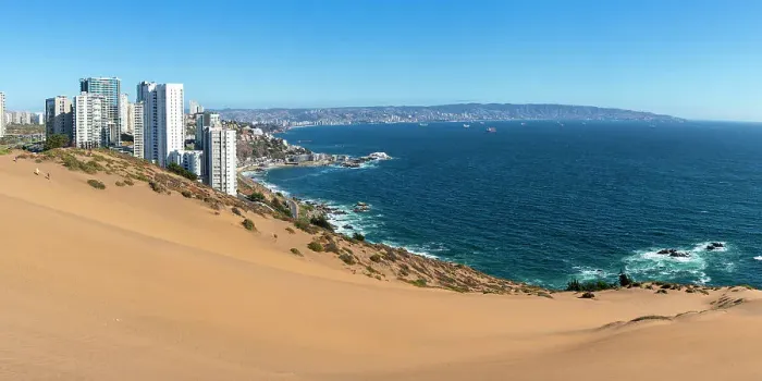 Framed Print : Sand dunes with high-rise buildings on coast and distant view of Vina del Mar and Valparaiso, Concon, Valparaiso Province, Valparaiso Region, Chile Framed Print : Sand dunes with high-rise buildings on coast and distant view of Vina del Mar and Valparaiso, Concon, Valparaiso Province, Valparaiso Region, Chile
