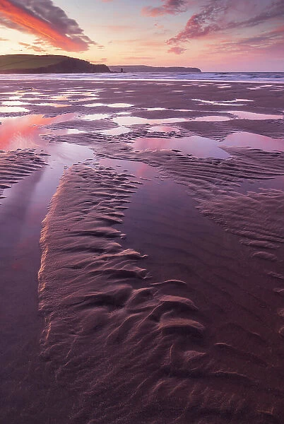 Sand patterns on the beach at dawn, Bigbury-on-Sea, Devon, England