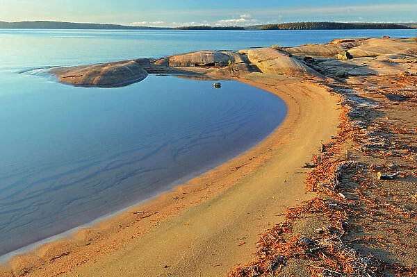 Sandy shore of Lake Superior at sunrise Rossport, Ontario, Canada