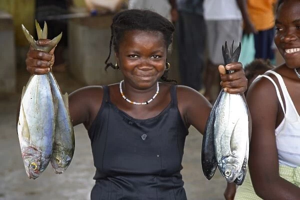 A Sao Tomense woman shows us what fish she is selling