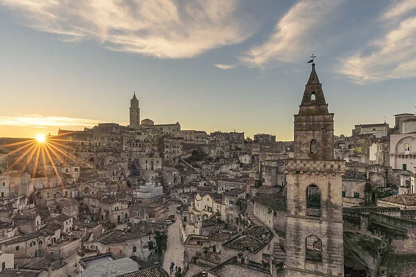The Sassi quarter at dawn, with San Pietro Barisano bell tower in the foreground. Matera