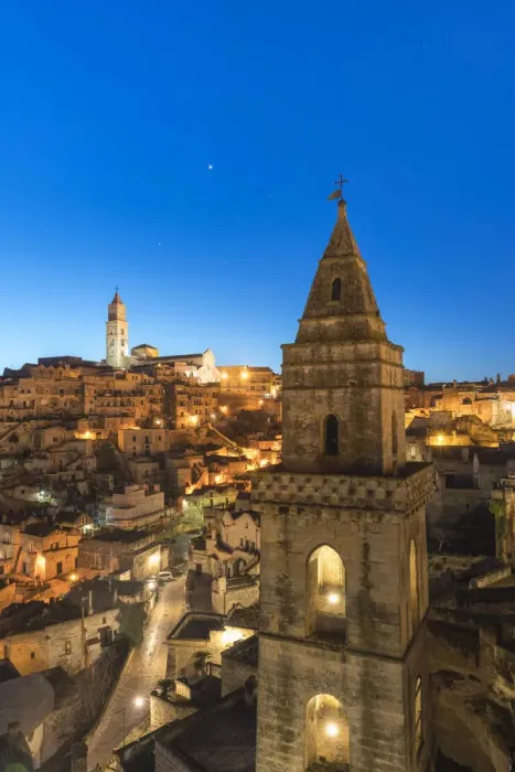 Framed Print : The Sassi quarter at dusk, with San Pietro Barisano bell tower in the foreground. Matera Framed Print : The Sassi quarter at dusk, with San Pietro Barisano bell tower in the foreground. Matera