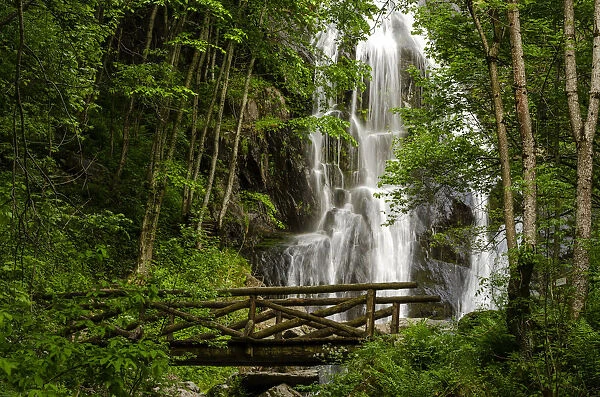 Saut waterfall and the wooden bridge in Pesio Valley, Chiusa Pesio, Piedmont, Italy