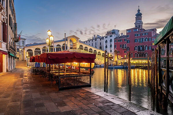 Scenic sunrise view of Grand Canal with Rialto Bridge, Venice, Veneto, Italy