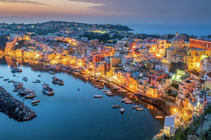Framed Print : Scenic view of the colorful fishing village of Corricella at dusk, Procida, Campania, Italy Framed Print : Scenic view of the colorful fishing village of Corricella at dusk, Procida, Campania, Italy