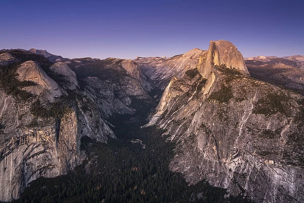 Scenic view of Half Dome granite rock formation at Yosemite National Park after sunset
