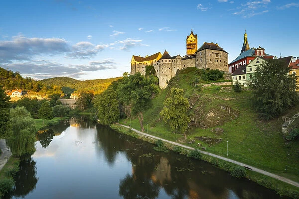 Scenic view of Loket Castle rising above Ohre river at sunset, Loket, Sokolov District