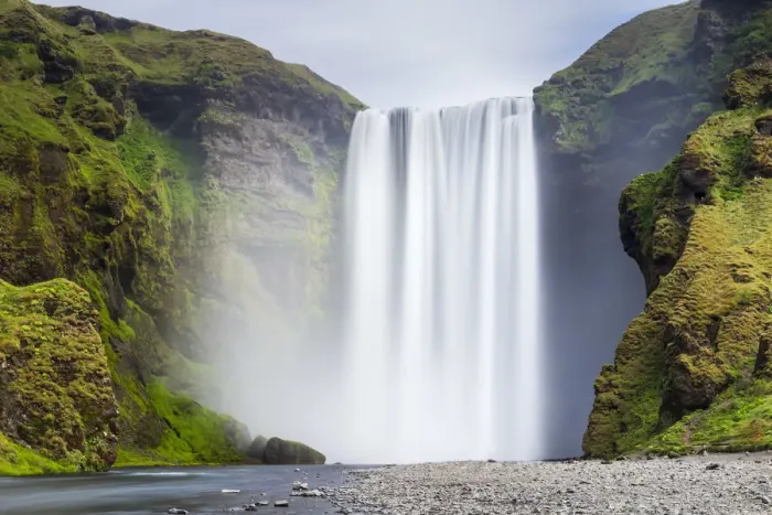Framed Print : Scenic view of Skogafoss waterfall on cliff, South Iceland, Iceland Framed Print : Scenic view of Skogafoss waterfall on cliff, South Iceland, Iceland