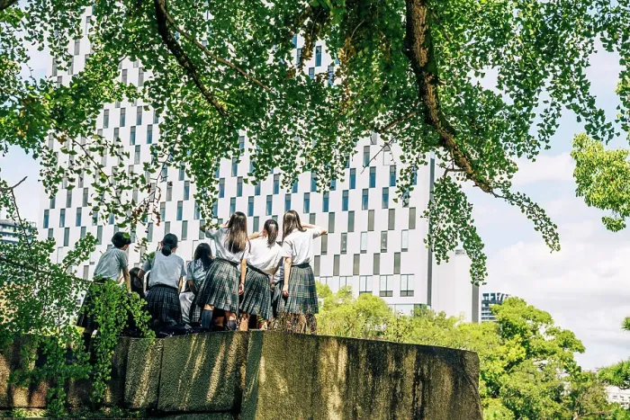 Framed Print : Schoolgirls from behind posing for a photo in Osaka, Japan Framed Print : Schoolgirls from behind posing for a photo in Osaka, Japan