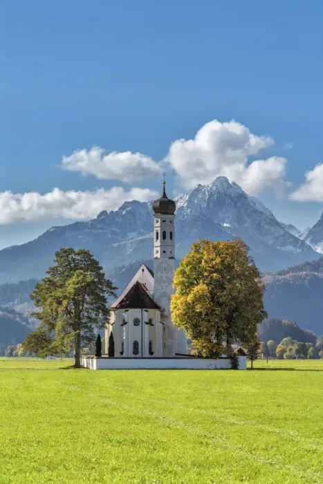 Framed Print : Schwangau, Swabia, Bavaria, Germany. The pilgrimage church of Saint Coloman. In the background the Gehrenspitze in the Tannheim mountains Framed Print : Schwangau, Swabia, Bavaria, Germany. The pilgrimage church of Saint Coloman. In the background the Gehrenspitze in the Tannheim mountains