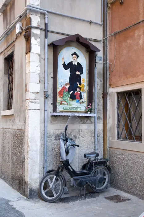Framed Print : Scooter and relgious wall mural, Chioggia, Venice, Veneto, Italy Framed Print : Scooter and relgious wall mural, Chioggia, Venice, Veneto, Italy