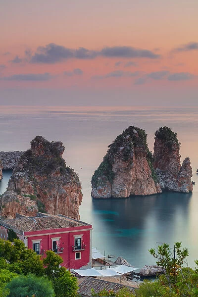 Scopello, Sicily. Elevated view of the tonnara and the sea stacks at dawn