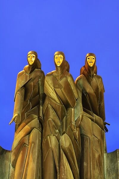 The sculpture 'Three Muses' by Stanislovas Kuzma crowning the main entrance to the National Drama Theatre has become an icon of Vilnius. The muses of Drama (Calliope), Comedy (Thalia) and Tragedy (Melpomene). Vilnius, Lithuania