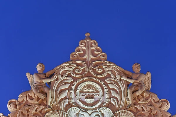 Detail of a sculpture in the upper part of the Salta Cathedral illuminated at night, Salta Historical Cask, Argentina
