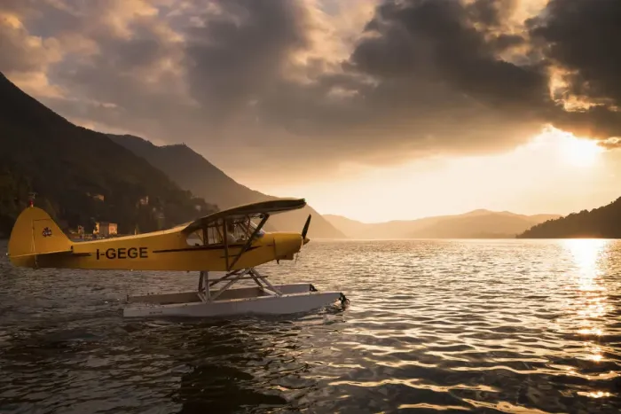 Framed Print : A seaplane on Como Lake at sunset. Lombardia. Italy Framed Print : A seaplane on Como Lake at sunset. Lombardia. Italy