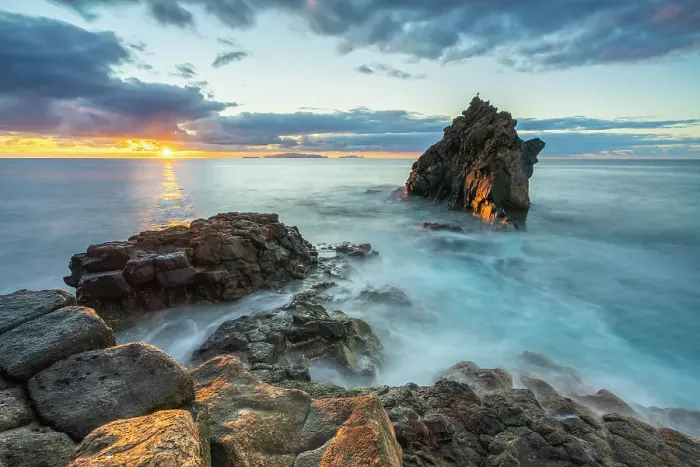 Framed Print : Seascape at rocky coast of Santa Cruz at sunrise, Madeira, Portugal Framed Print : Seascape at rocky coast of Santa Cruz at sunrise, Madeira, Portugal