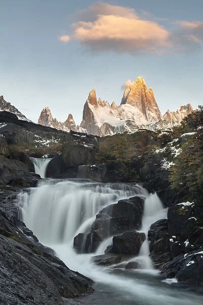 Secret waterfall and Fitz Roy at sunrise, El Chalten, Santa Cruz province, Argentina