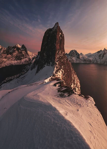 Segla mountain rising above the fjord during a winter sunset, Senja island, Norway