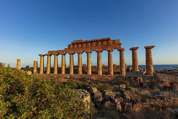 Selinunte, Sicily. Greek temple at sunset with the sea in the background