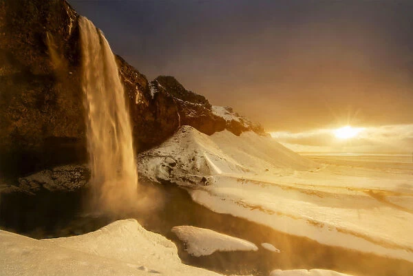 Seljalandfoss during a dramatic winter sunset, Iceland