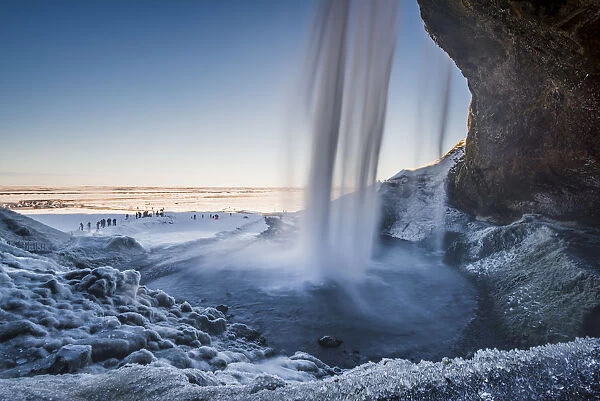 Seljalandfoss waterfall frozen in winter, Iceland