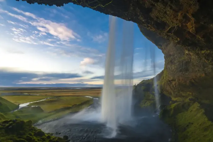 Framed Print : Seljalandsfoss waterfall seen from under cliff overhang during sunset, South Iceland Framed Print : Seljalandsfoss waterfall seen from under cliff overhang during sunset, South Iceland