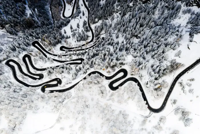 Framed Print : Serpentine road crossing the snowy woods, aerial view, Maloja Pass, Bregaglia Valley Framed Print : Serpentine road crossing the snowy woods, aerial view, Maloja Pass, Bregaglia Valley