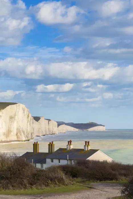Framed Print : Seven Sisters cliffs and the coastguard cottages, from Seaford Head across the River Framed Print : Seven Sisters cliffs and the coastguard cottages, from Seaford Head across the River